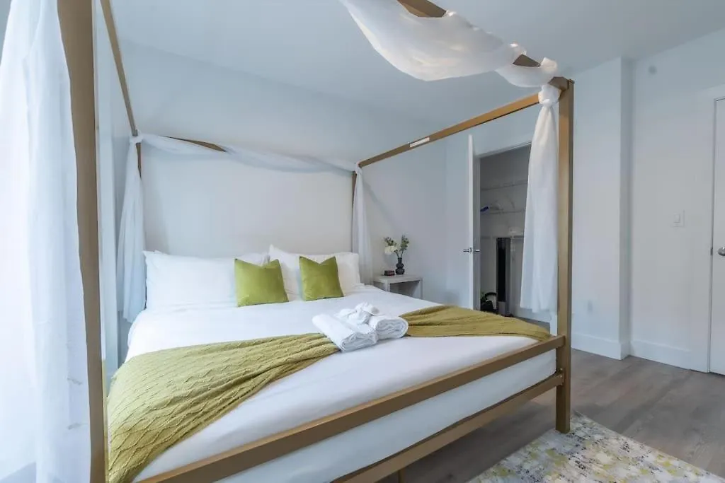 Spacious Airport Suite: Two-Bedroom Comfort with Laundry Orange