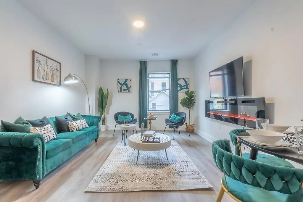 Spacious Airport Suite: Two-Bedroom Comfort with Laundry Orange Apartment