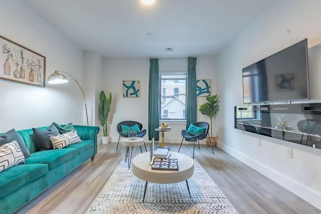 Spacious Airport Suite: Two-Bedroom Comfort with Laundry Orange Apartment