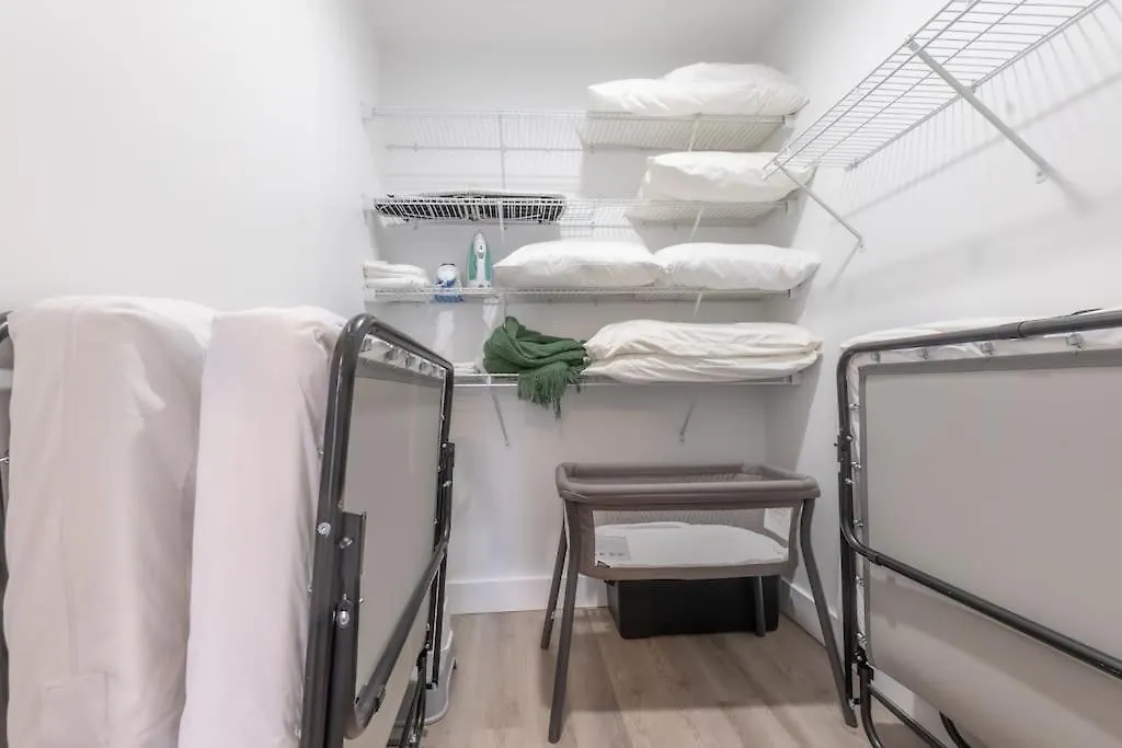 Spacious Airport Suite: Two-Bedroom Comfort with Laundry Orange Apartment
