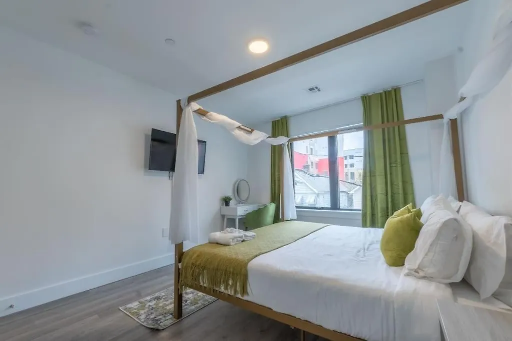Spacious Airport Suite: Two-Bedroom Comfort with Laundry Orange Apartment