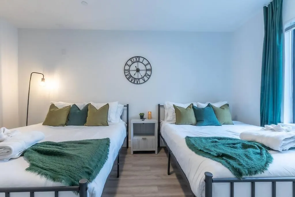 Spacious Airport Suite: Two-Bedroom Comfort with Laundry Orange United States